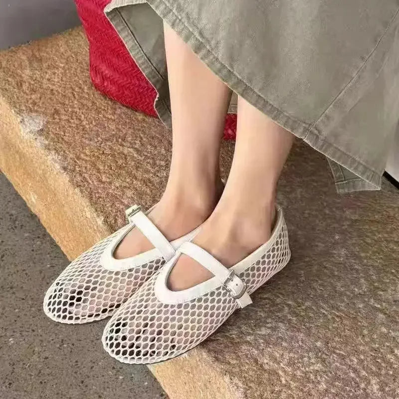Women's mesh Mary Jane flats with breathable upper and adjustable buckle strap for all-day comfort
