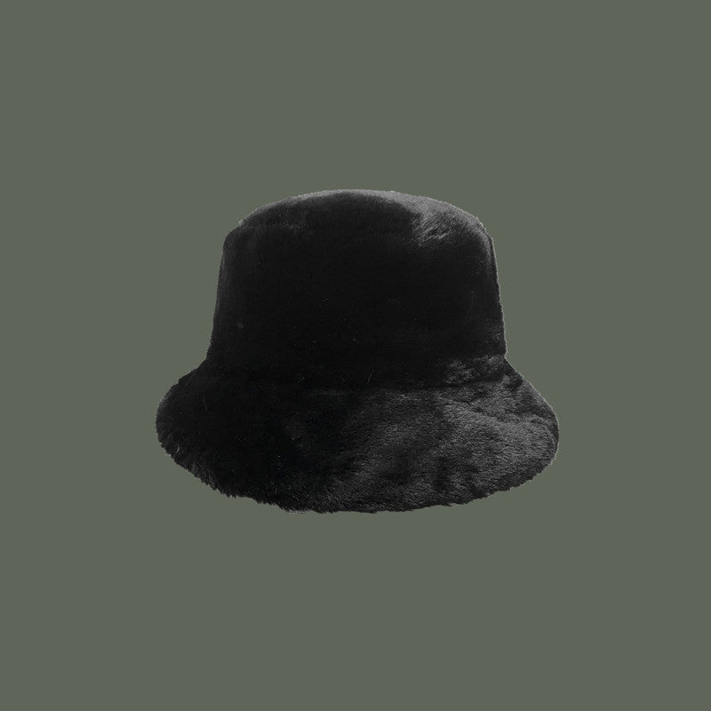 Faux fur bucket hat in leopard print plush texture cozy chic winter fashion accessory