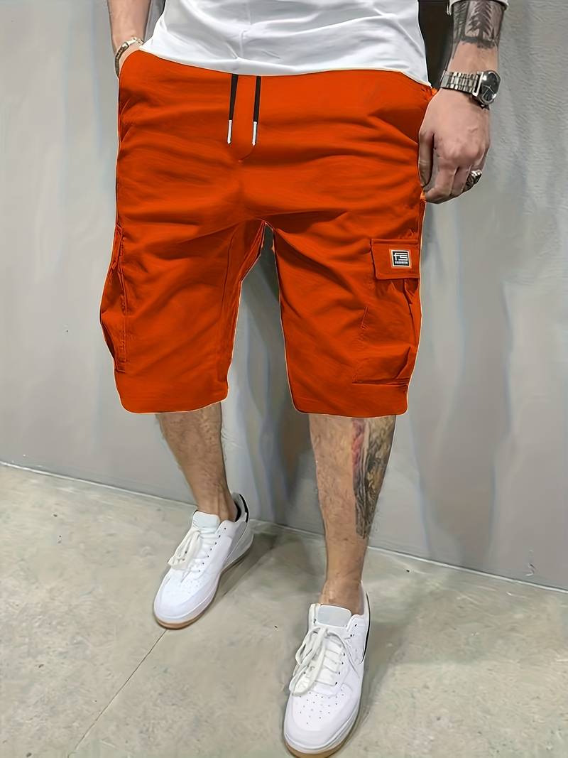 Men's palm tree graphic shorts in vibrant tropical print, relaxed comfort fit for beach summer wear