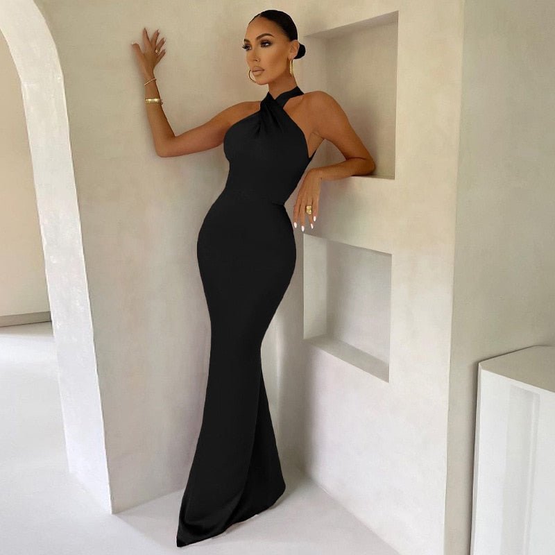 Women's long black evening dress sleeveless fluid cut with elegant high collar timeless sophistication