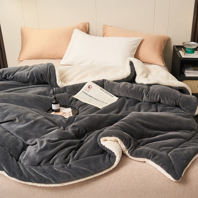 Reversible sherpa flannel throw blanket in neutral tones with dual-texture cozy design for home lounging
