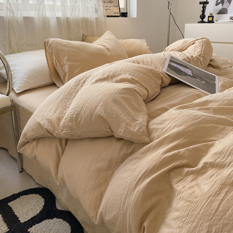 Washed cotton bedding set in neutral tones, minimalist style with pre-softened lived-in texture