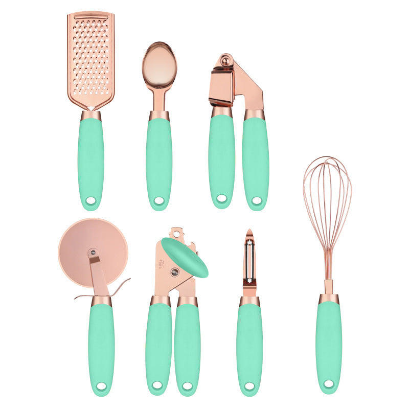 Copper and black 7-piece kitchen utensil set with ergonomic handles for precise home cooking