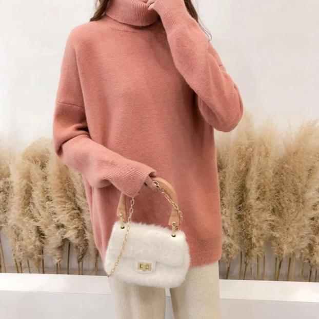 Autumn relaxed-fit turtleneck sweater in solid neutral tone with clean minimalist lines for everyday wear