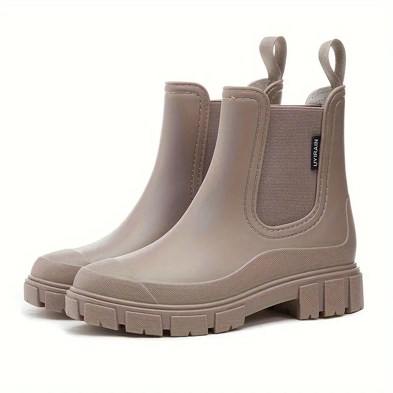 Women's black waterproof slip-on Chelsea boots with elastic side panels for effortless style