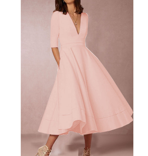 Retro 60s swing V-neck dress in vintage style with flattering flared silhouette and timeless chic fit