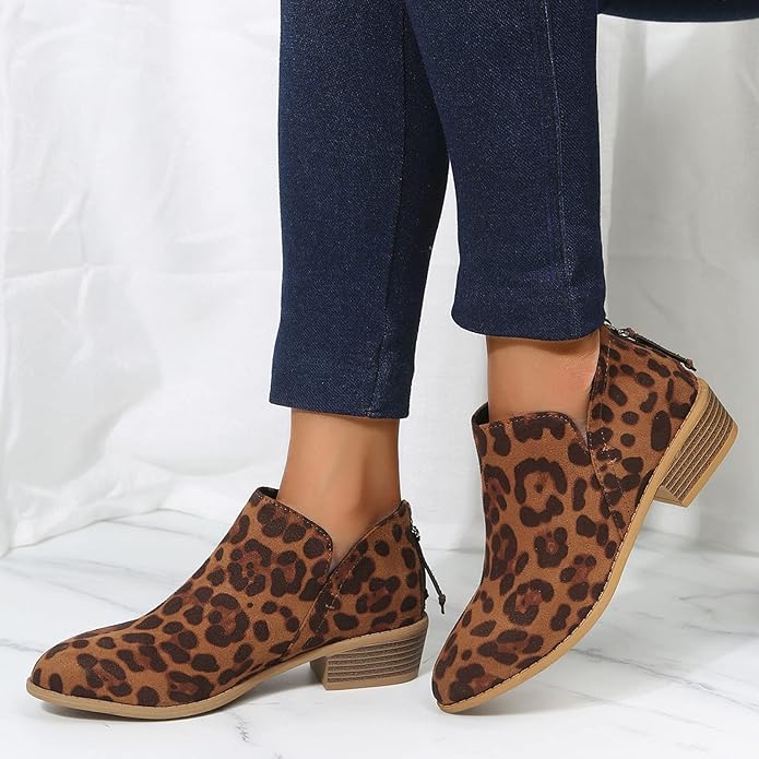 Women's black cushioned ankle boots with sleek silhouette and all-day comfort support for everyday wear