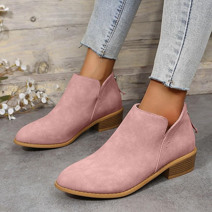 Women's black cushioned ankle boots with sleek silhouette and all-day comfort support for everyday wear