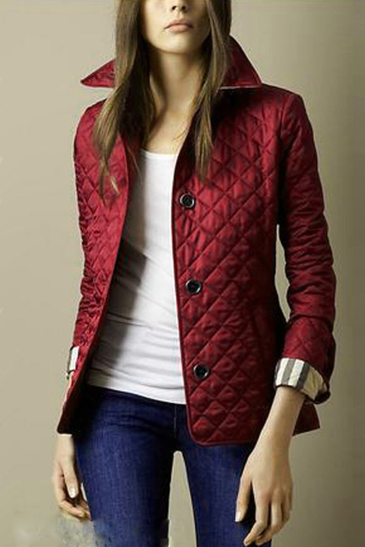 Women's winter puffer jacket tailored fit diamond quilting button closure versatile cold-weather style