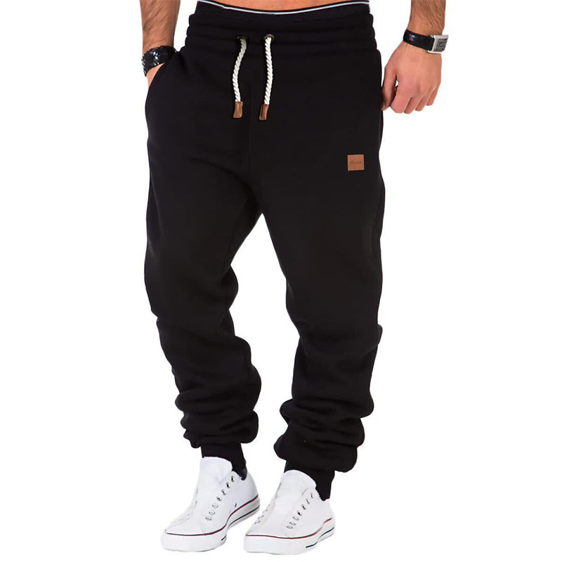 Men's gray fleece sweatpants with drawstring elastic waistband, relaxed fit for all-day comfort