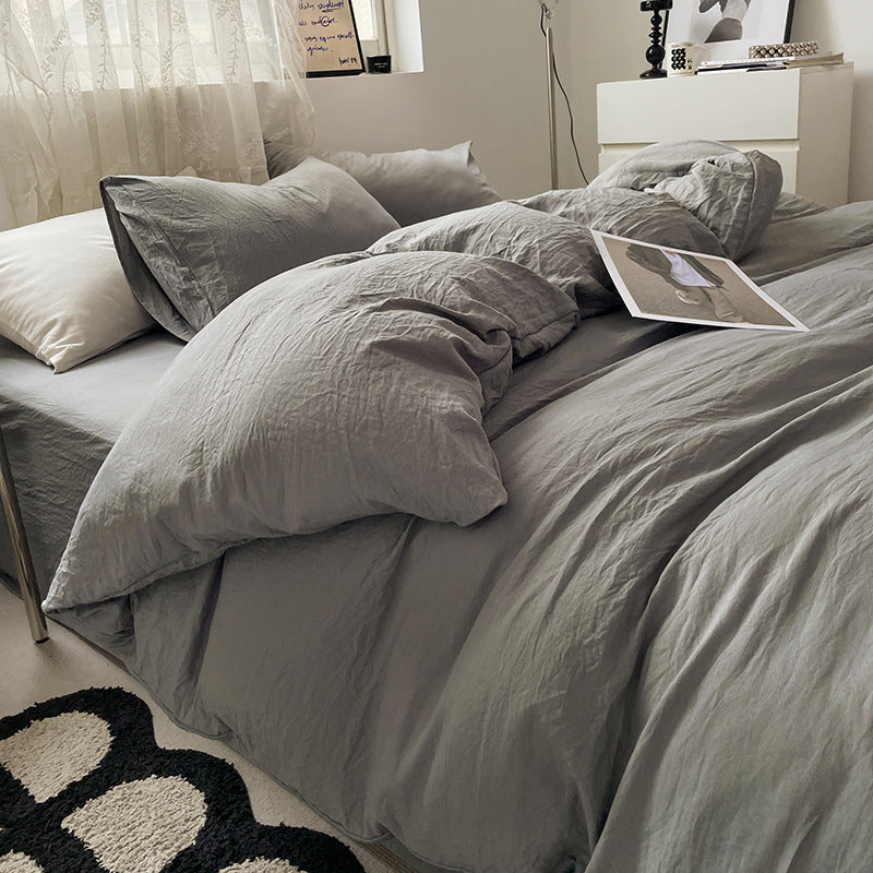 Washed cotton bedding set in neutral tones, minimalist style with pre-softened lived-in texture