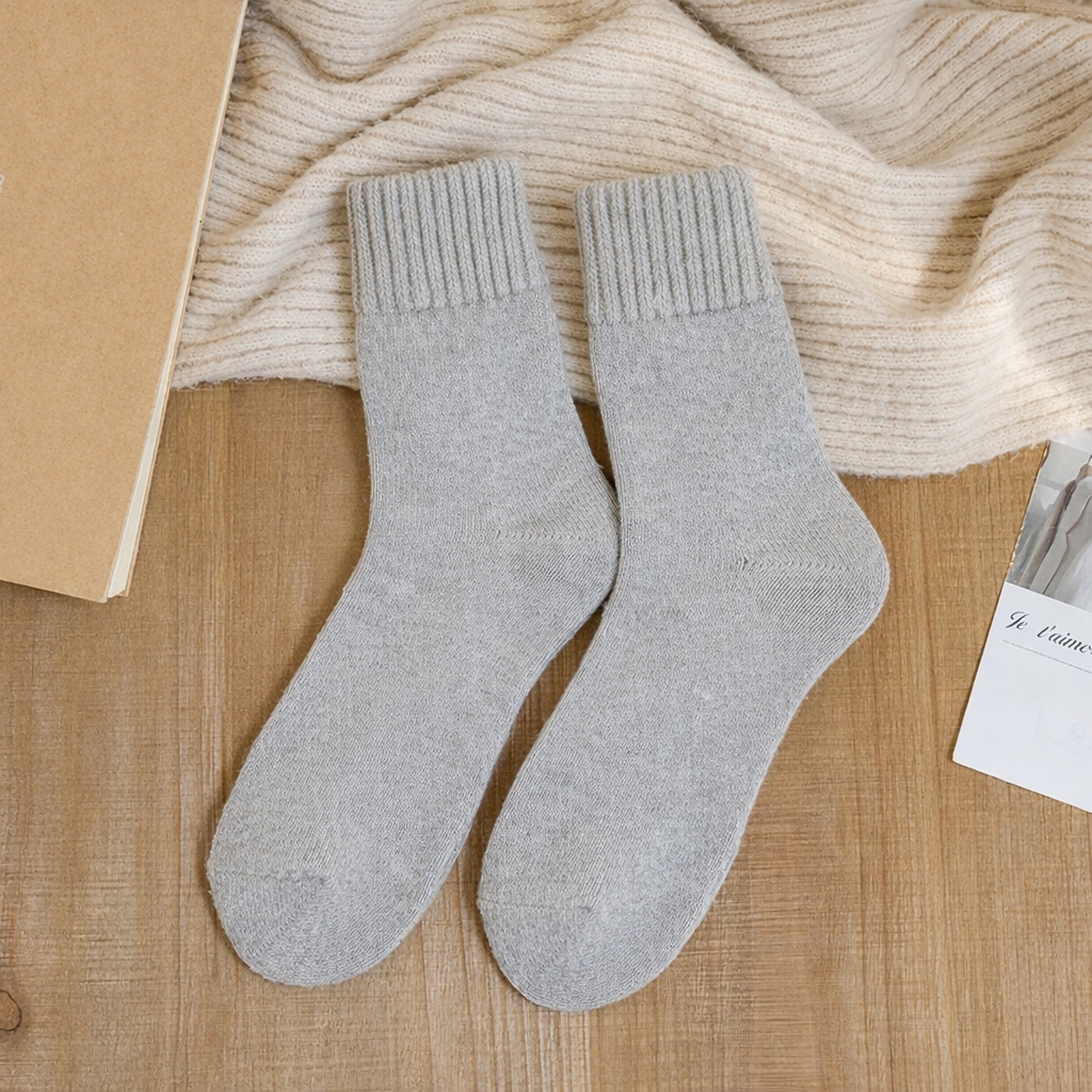 Women's ribbed wool crew socks in classic neutral tones, cozy luxurious warmth with snug textured fit