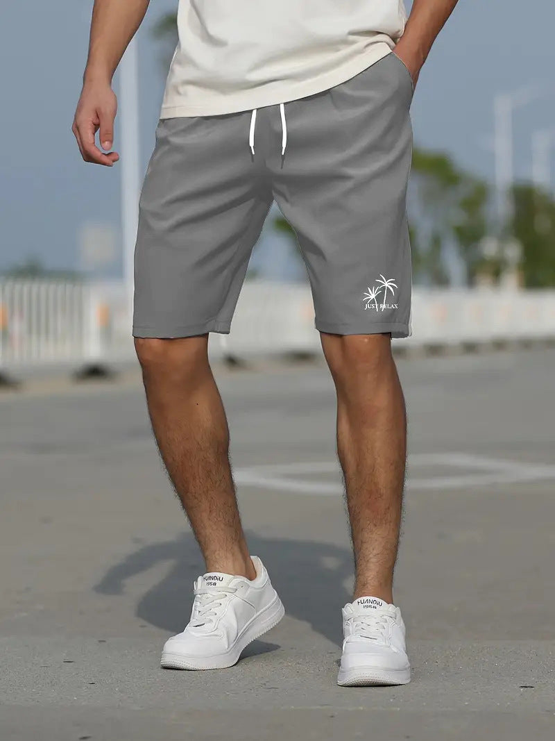 Men's mint green quick-dry swim shorts elastic waist mid-thigh cut lightweight beach pool versatile
