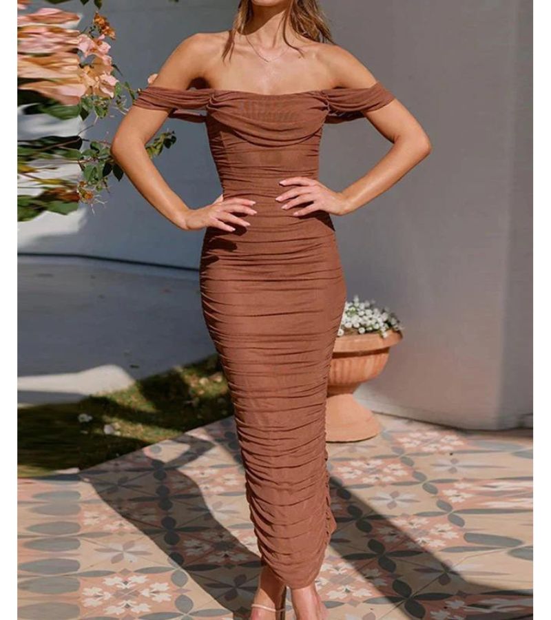 Black off-shoulder evening dress tailored draped silhouette elegant formal gown confident women