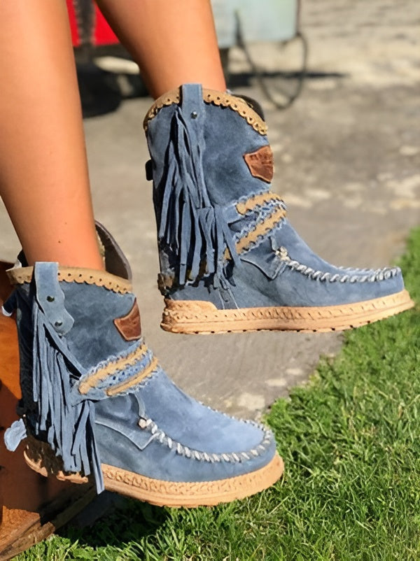 Women's fringe moccasin boots with handcrafted stitching, flowing fringe detail, lightweight festival style