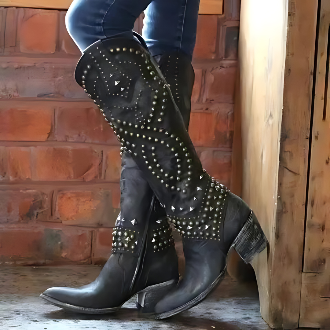 Women's western cowboy boots with bold studded decor and patterned stitching for everyday style