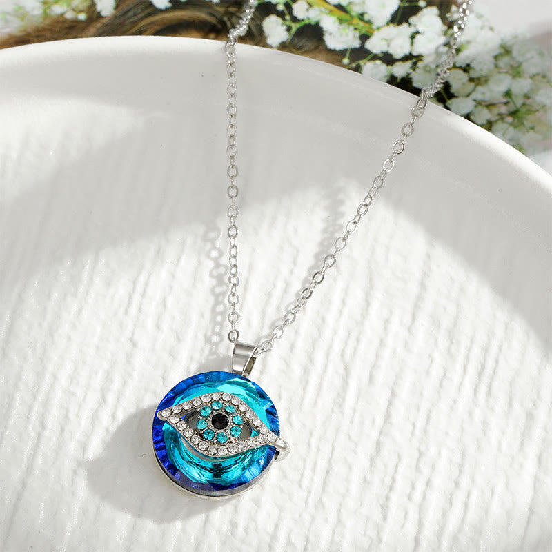 Silver evil eye protection necklace with blue accent stones, spiritual amulet jewelry for women