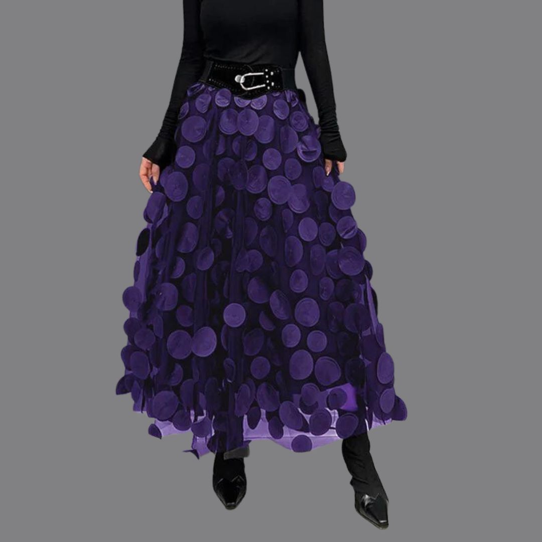 Women's elegant long polka dot skirt timeless silhouette refined femininity everyday chic versatile
