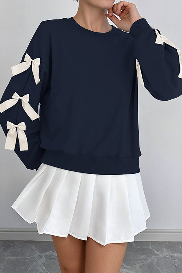 Women's loose hip-length sweatshirt with festive Christmas bow embroidery, round neck, casual winter style