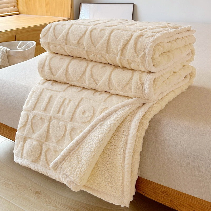 Soft blue embossed heart sherpa blanket reversible plush design for cozy living rooms