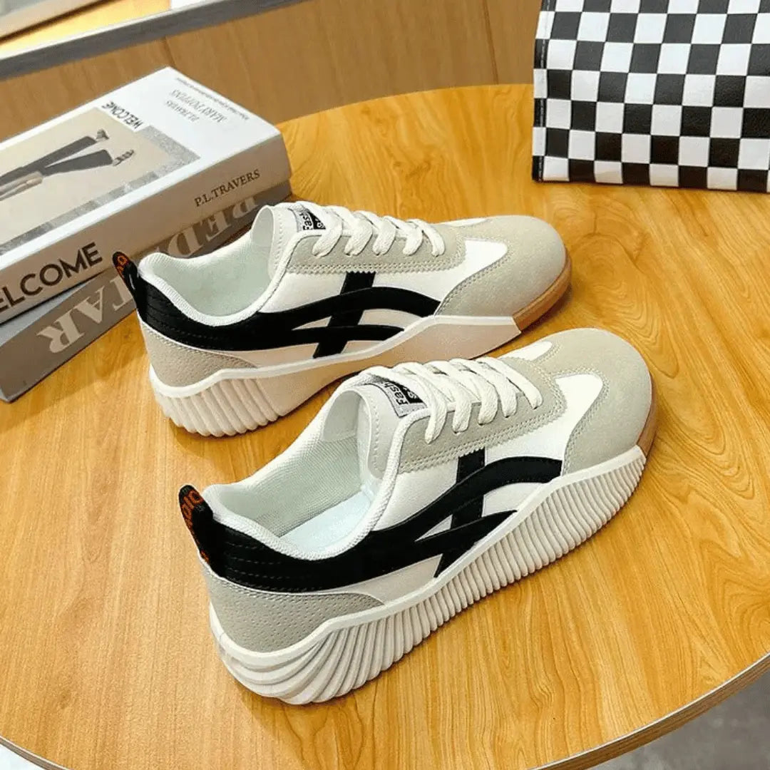 Women's chunky canvas sneakers with leather accents, bold platform sole, and cloud-soft cushioning