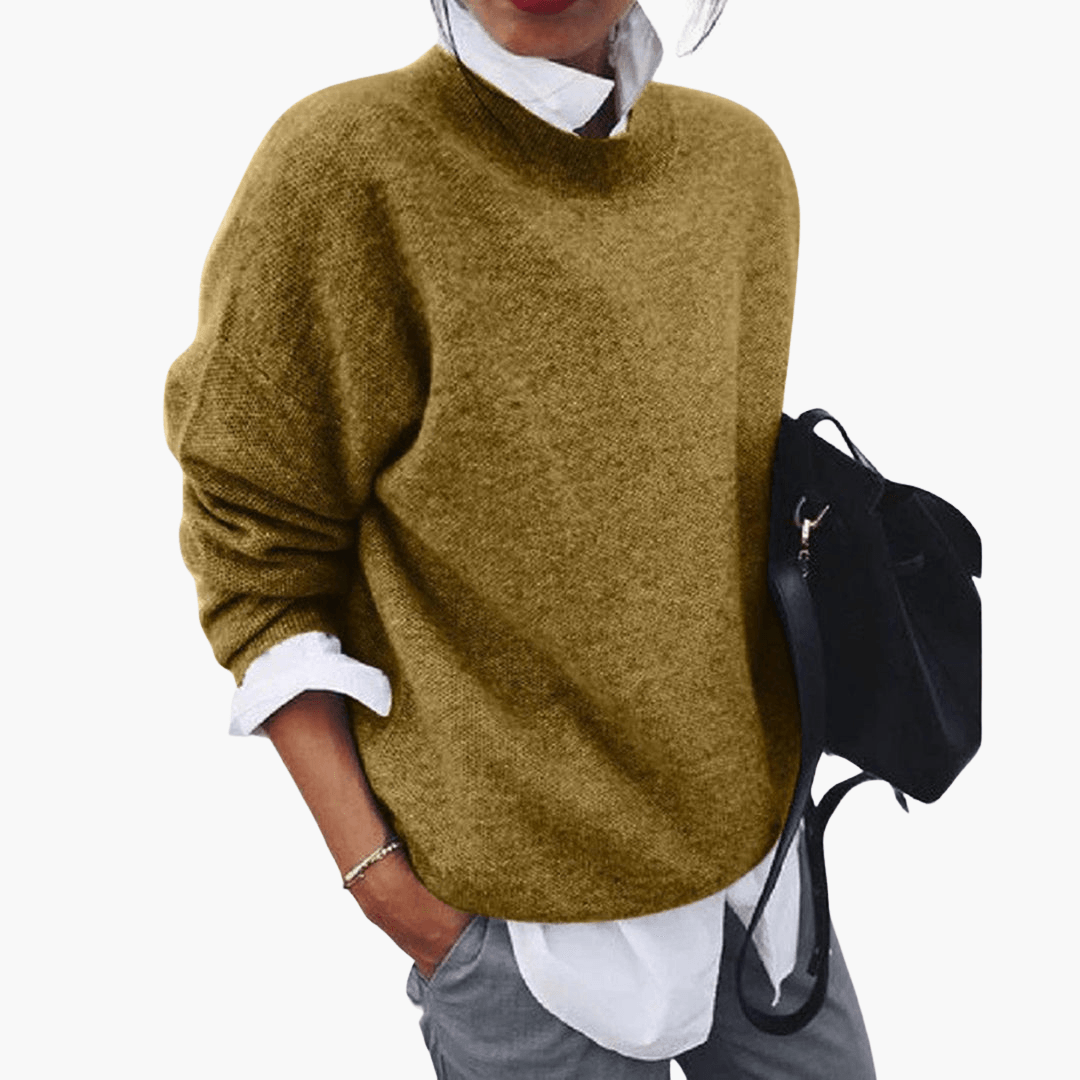 Women's cream oversized high collar knit sweater with ultra-soft fabric and elegant relaxed silhouette