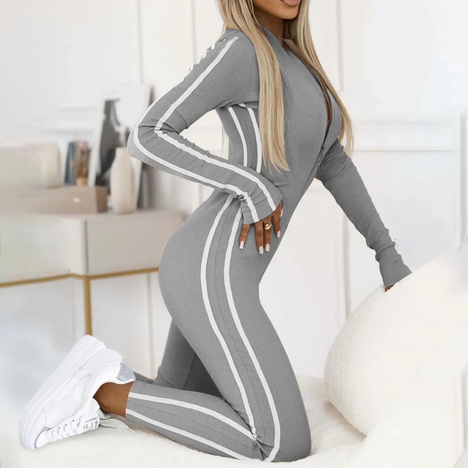Women's black body-sculpting lounge jumpsuit sleek figure-flattering stretch silhouette all-day comfort