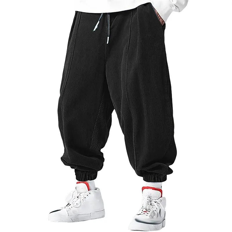 Olive corduroy harem jogger wide-rib oversized patch pockets relaxed streetwear silhouette