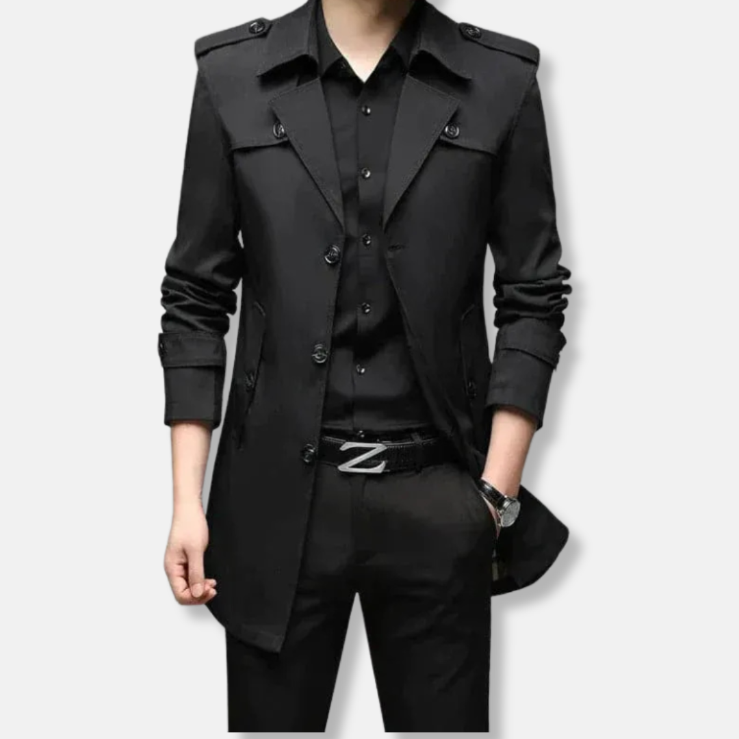 Men's slim fit thigh-length trench coat with button front, epaulets, and storm flaps