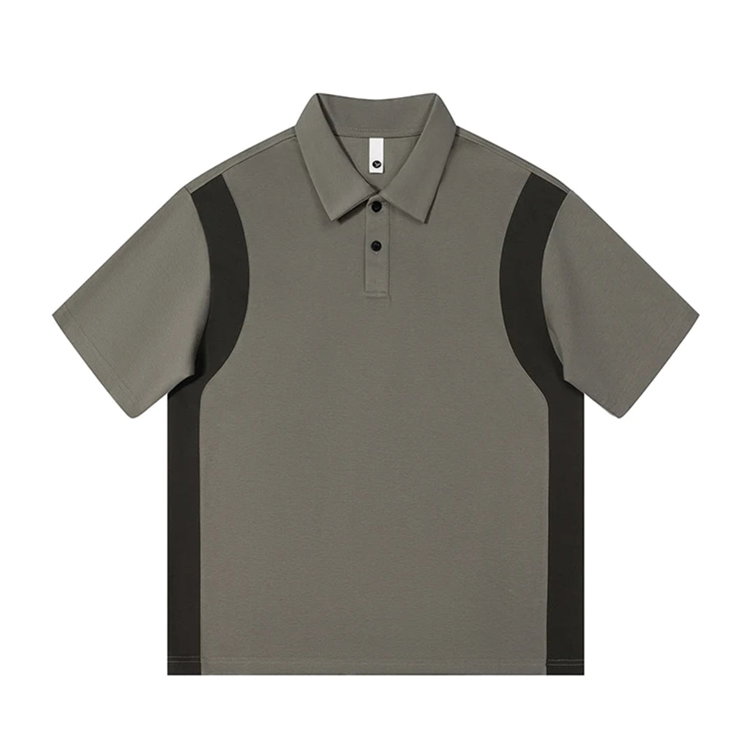 Navy blue soft-touch cotton blend polo with contrast panels, sculpted silhouette, loose modern fit