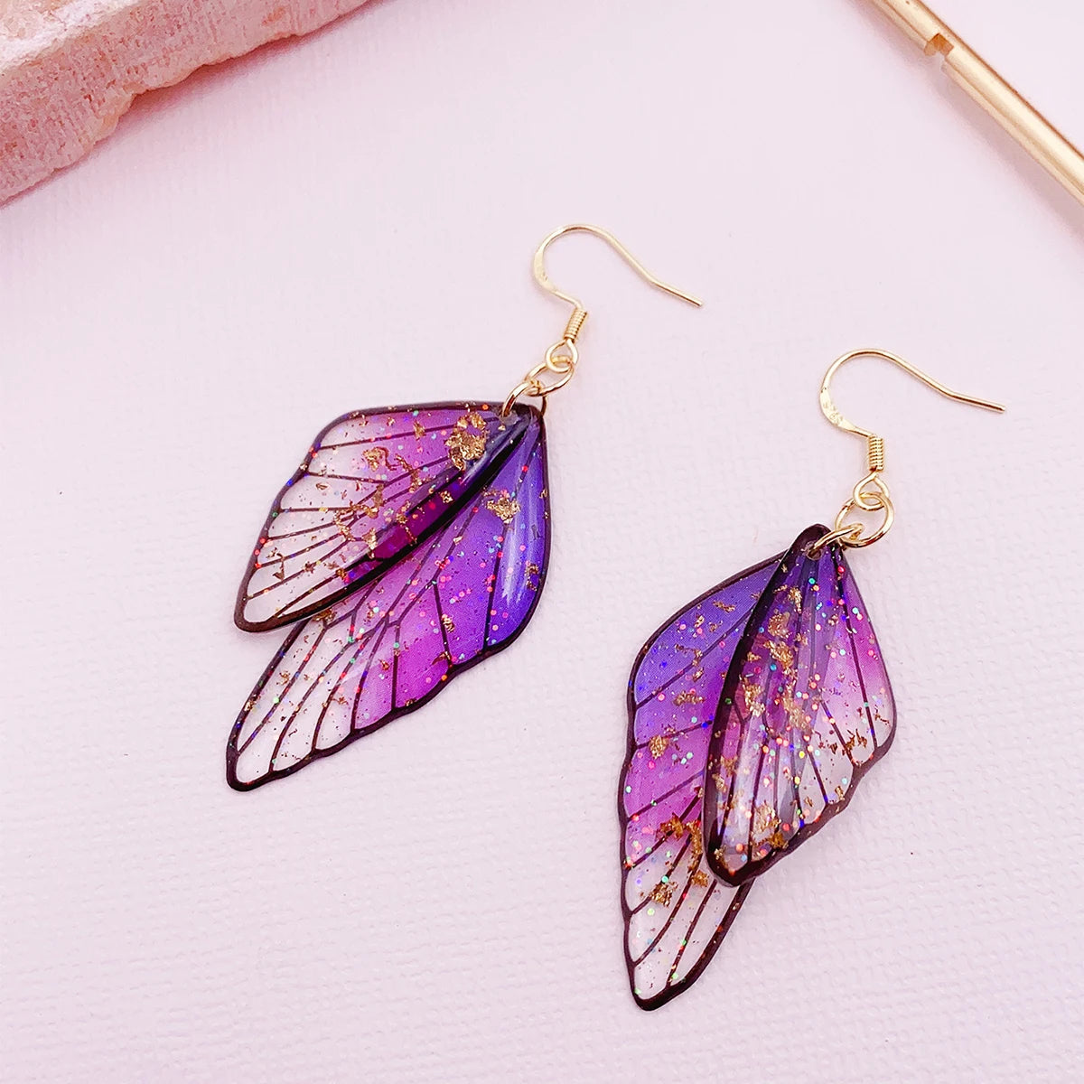 Ombré butterfly wing dangle earrings in translucent resin with gold foil shimmer, ultra-lightweight glam style