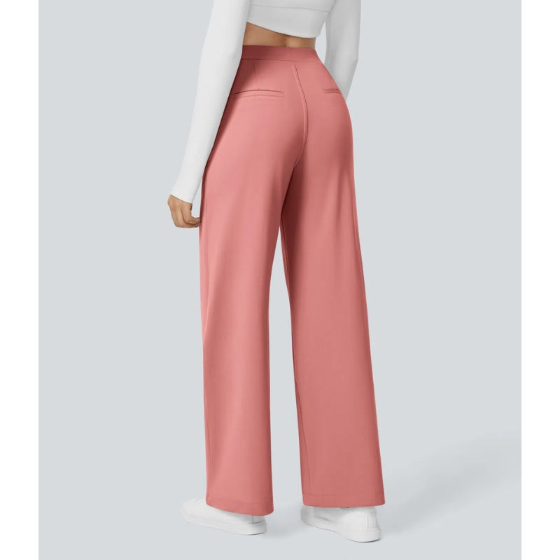 Beige high-waisted wide-leg work pants with front pleats and a polished professional silhouette