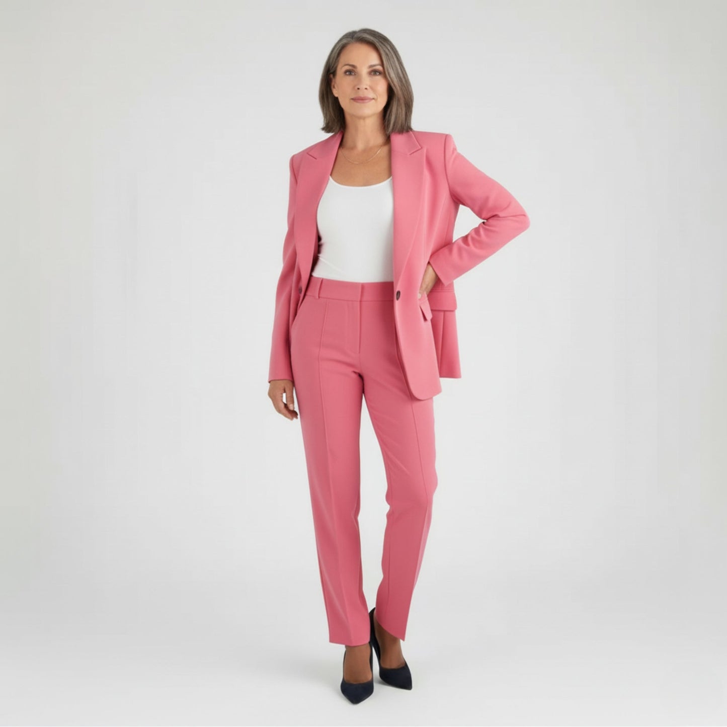 Navy women's tailored business pantsuit blazer and trousers set elegant workwear professional silhouette