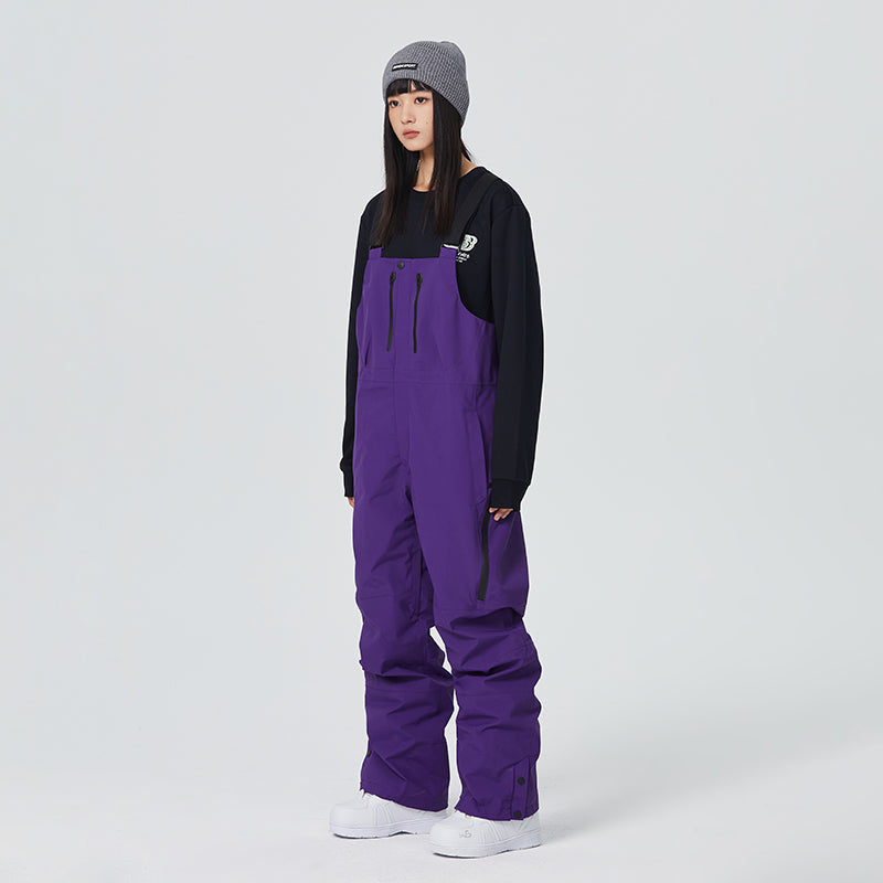 Women's sage green waterproof bib snow pants with adjustable suspenders and fully taped seams