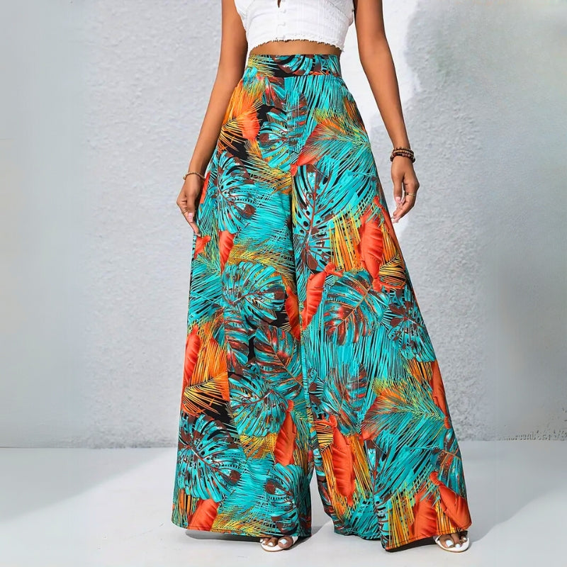 Women's high-waist relaxed tropical print cotton pants with roomy pockets, bold colorful pattern