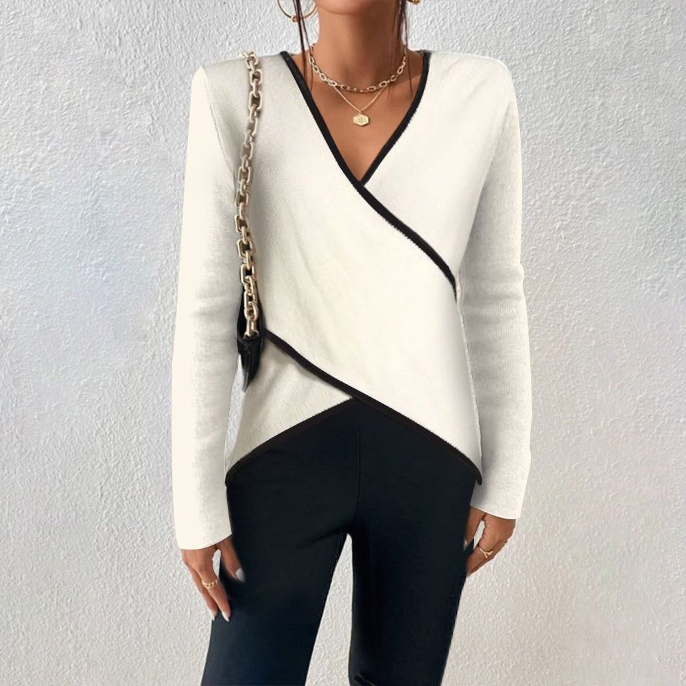 Women's wrap knit top in neutral tone, V-neck silhouette with contrasting trim detail