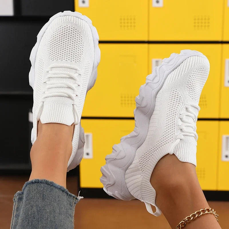Xeon athletic sneaker with precision knit upper, wave outsole, and cushioned bounce in bold design