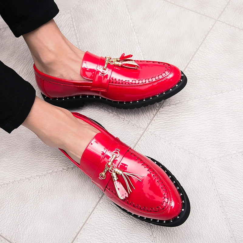 Men's black patent leather loafer slip-on with gold embellishments and plush sheepskin insole