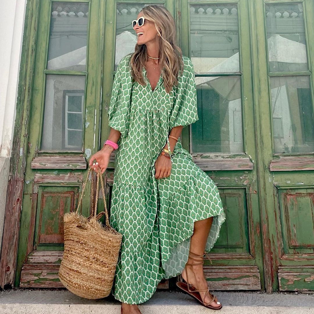 Women's bohemian floral midi dress in verde, V-neck flutter sleeves, loose flowy vintage silhouette