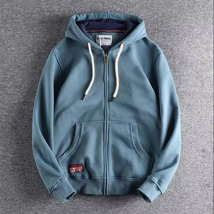 Heavyweight zip hoodie in fade-resistant color, cotton-polyester blend with reinforced stitching for active wear