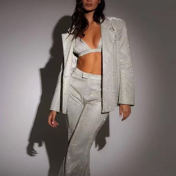 Women's silver sequined blazer suit set with lapels and straight-cut pants for party occasions