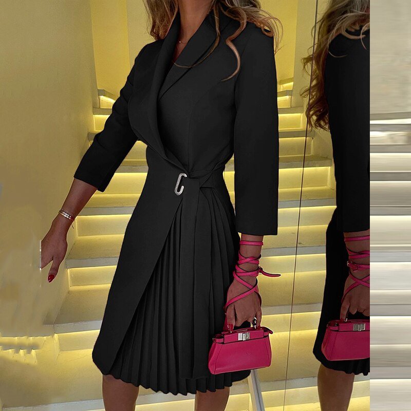 Black notched collar blazer dress with tailored structure and feminine silhouette for office or occasion