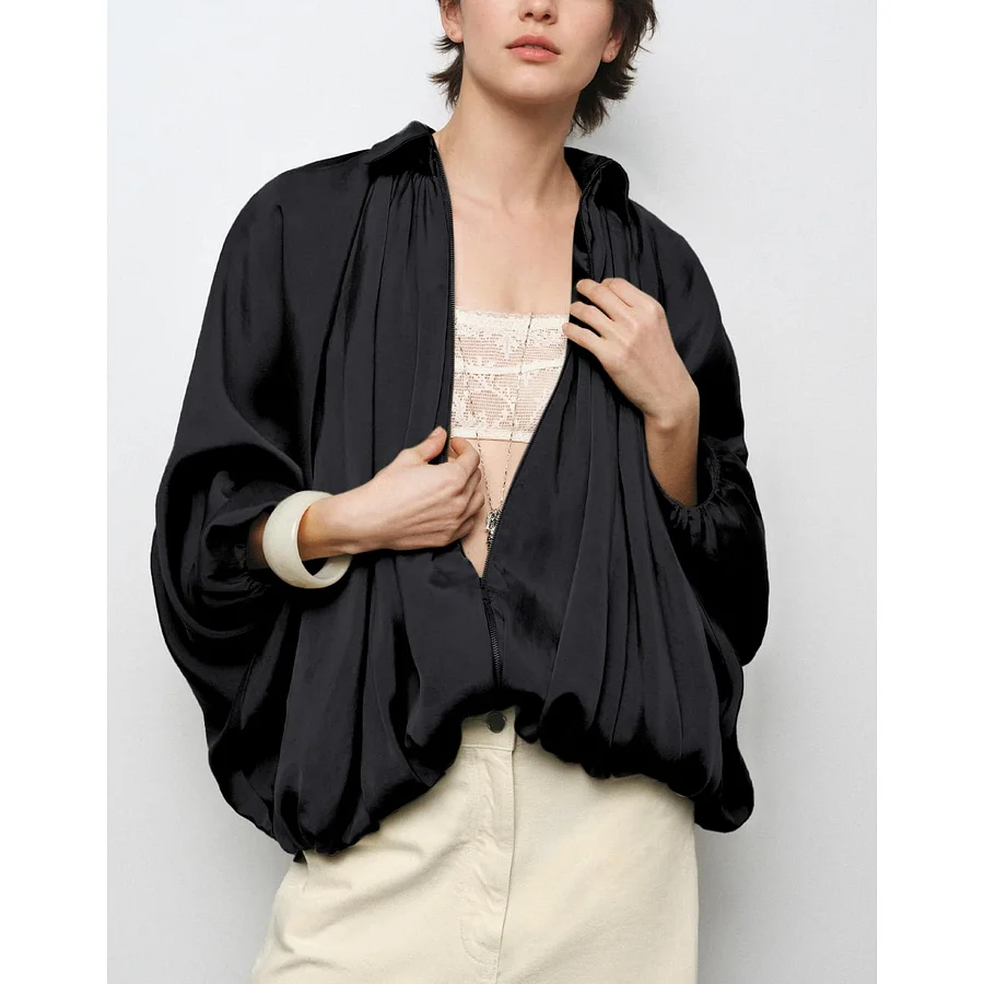 Black batwing sleeve puff bomber jacket with 3D patchwork detailing and loose fit streetwear silhouette