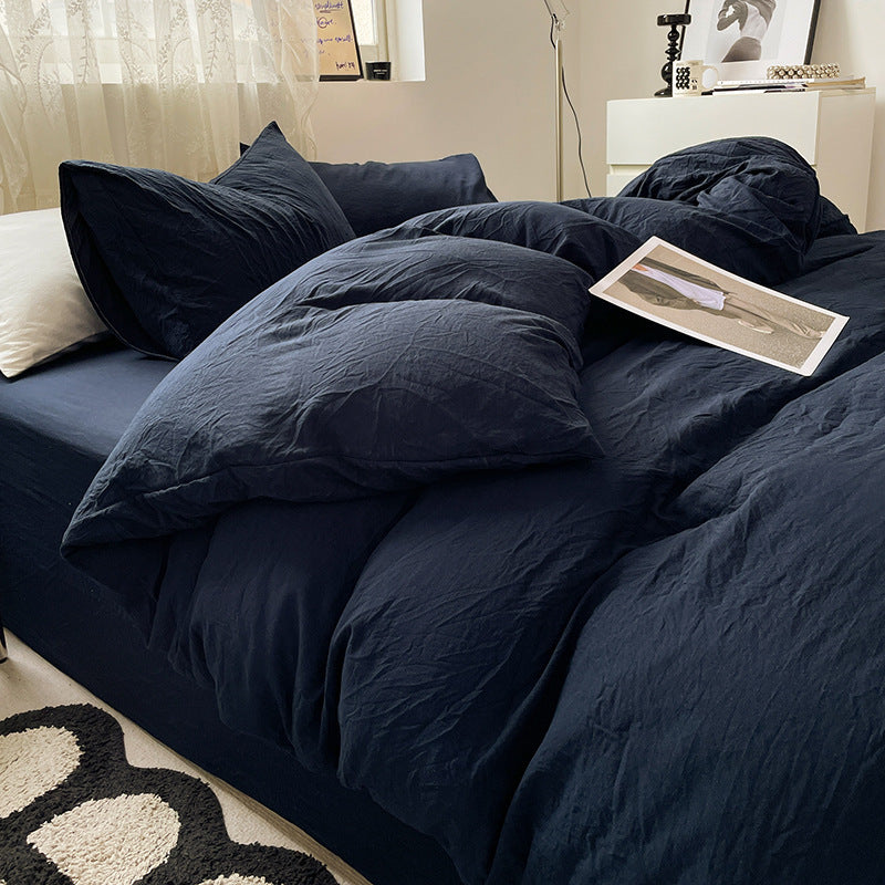 Washed cotton bedding set in neutral tones, minimalist style with pre-softened lived-in texture