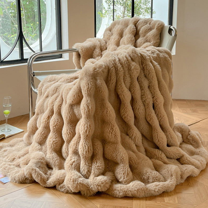 Beige faux fur throw blanket ultra-plush cloudlike texture cozy luxury contemporary home decor