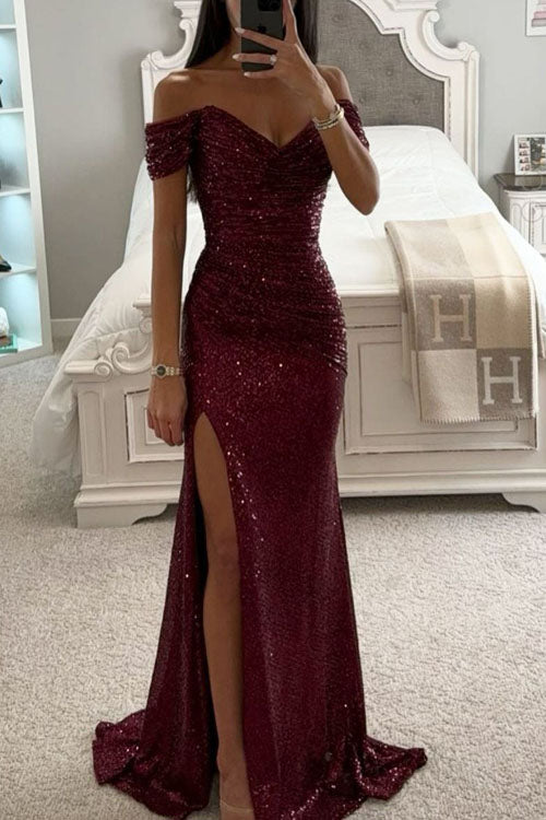 Women's silver sequin off-shoulder party dress with thigh-high slit and elegant evening glam fit