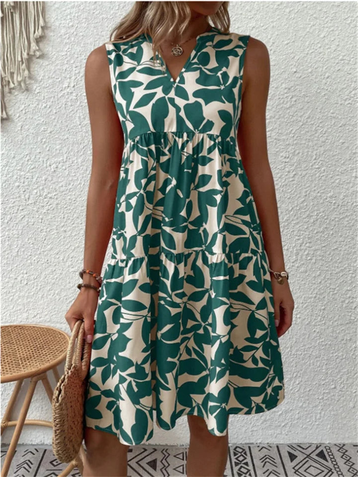 Floral printed tiered sleeveless dress with V-neck and gathered waist in lightweight fabric