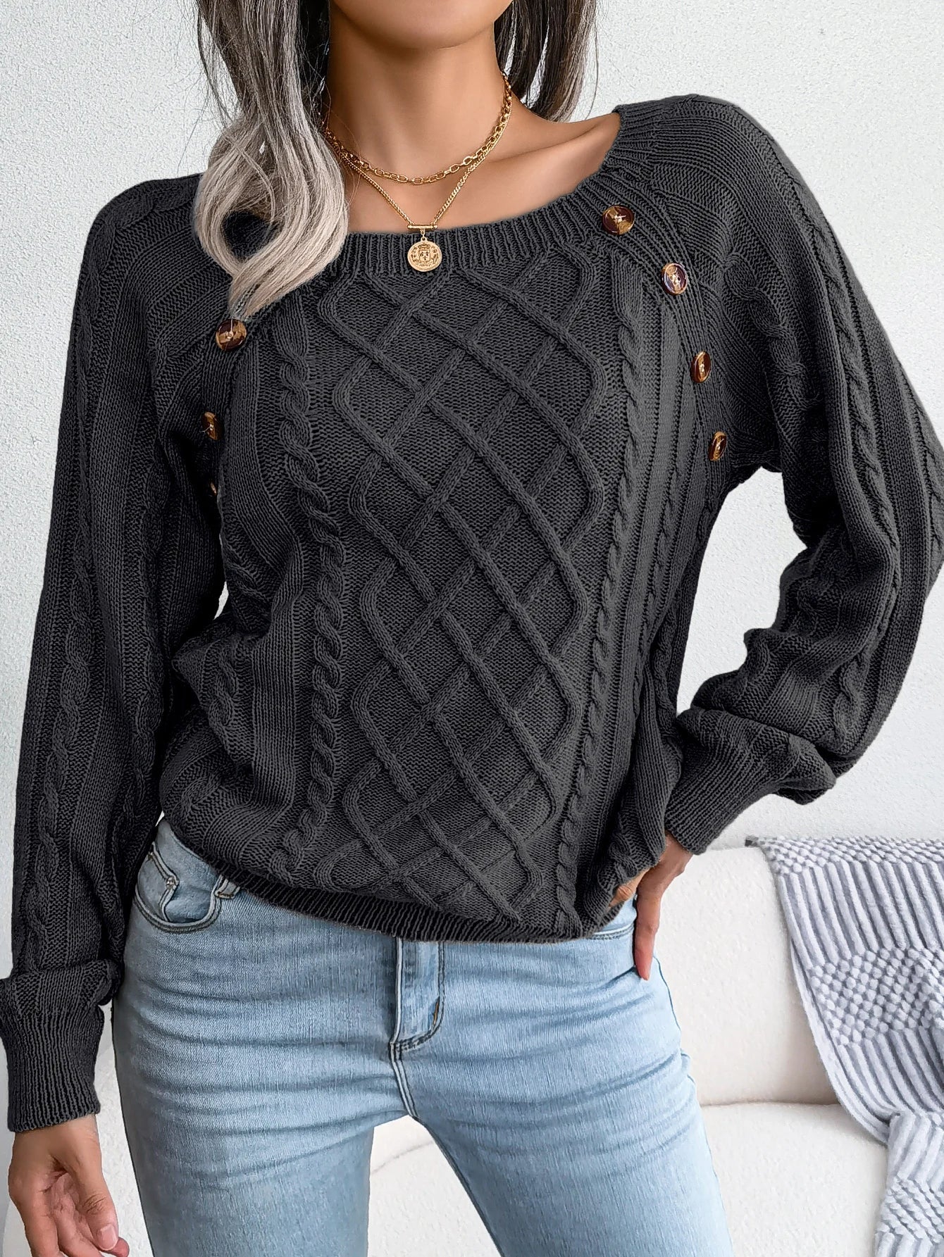 Women's cream diamond cable knit pullover sweater with button details, cozy relaxed fit for layering