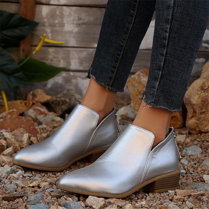Women's black cushioned ankle boots with clean silhouette and all-day lightweight supportive design
