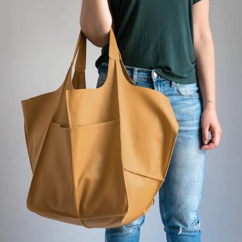 Oversized genuine leather tote bag professional carryall with secure magnetic closure premium style